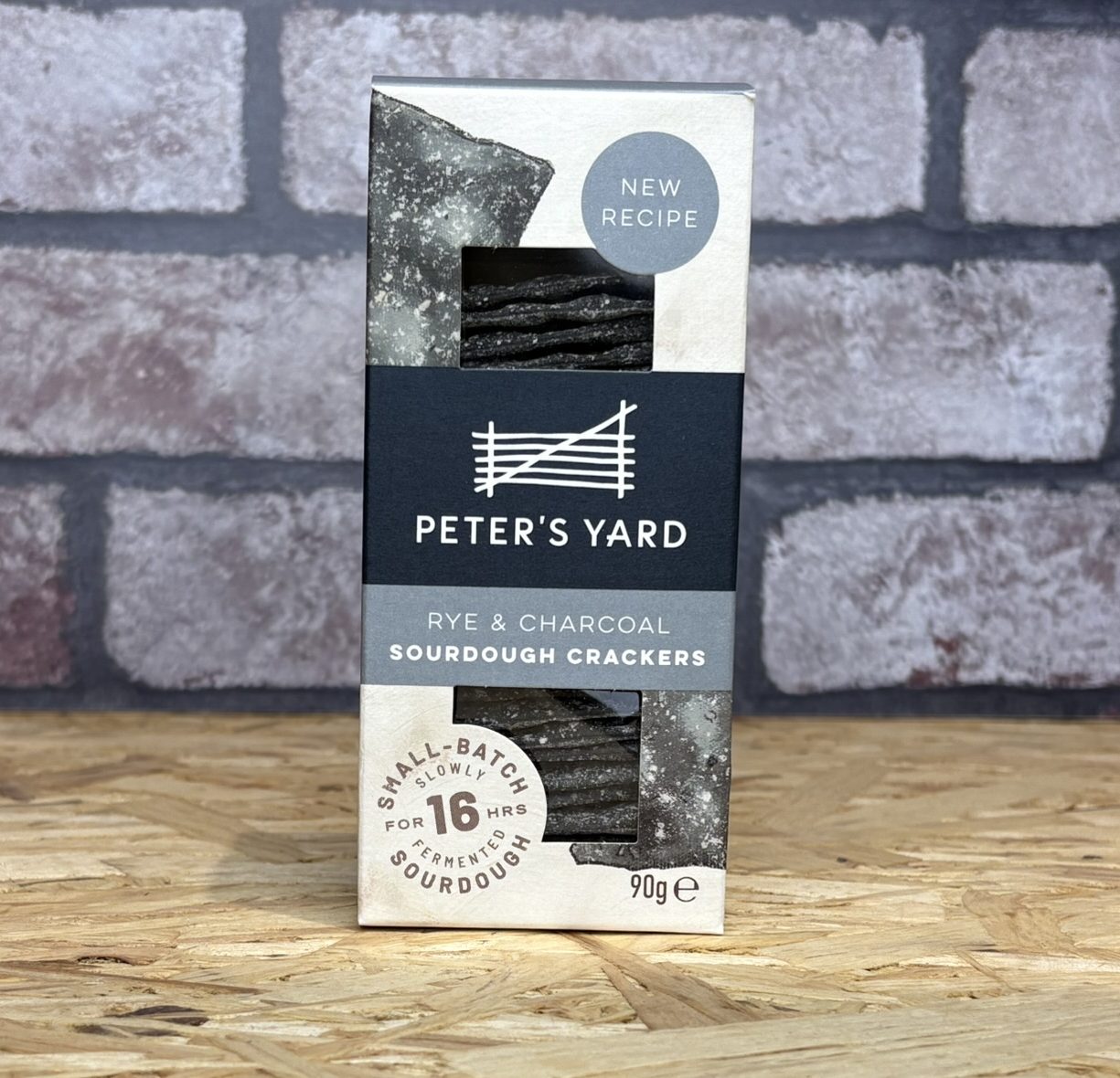 Rye and Charcoal Sourdough Crackers in monochrome carton