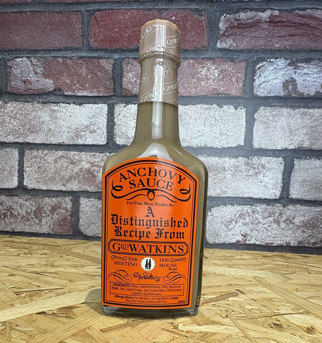 Glass bottle of anchovy sauce