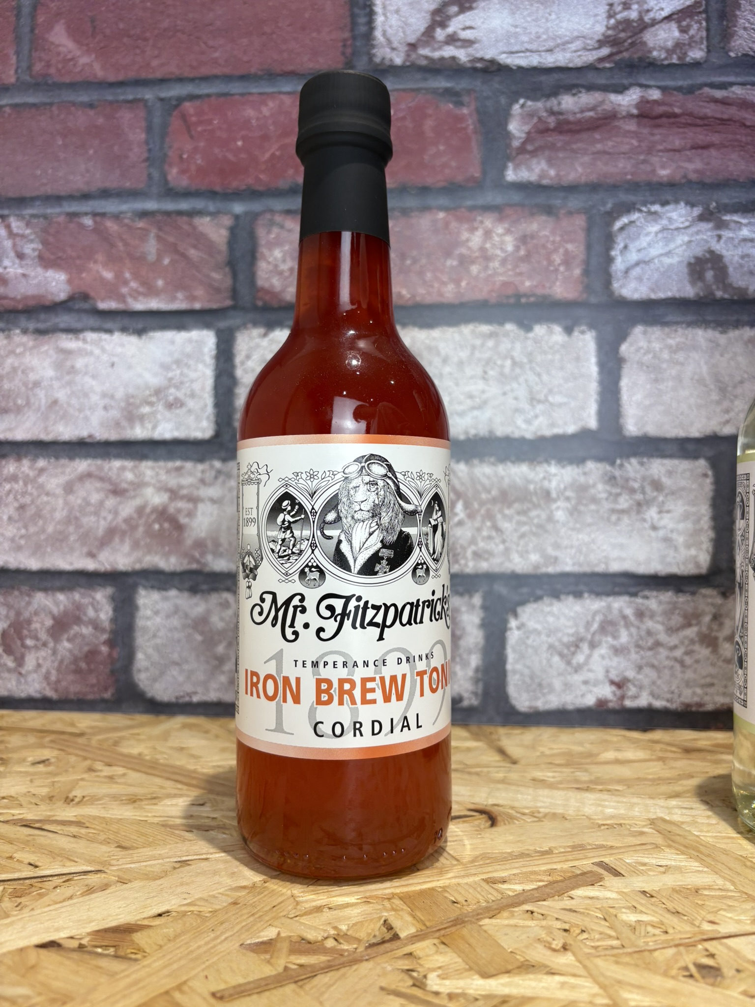 bottle of iron brew (orange liquid)