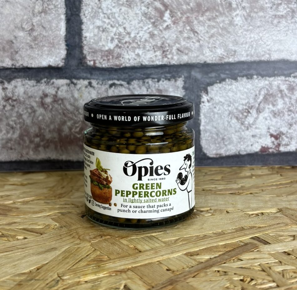 jar of green peppercorns in salted water